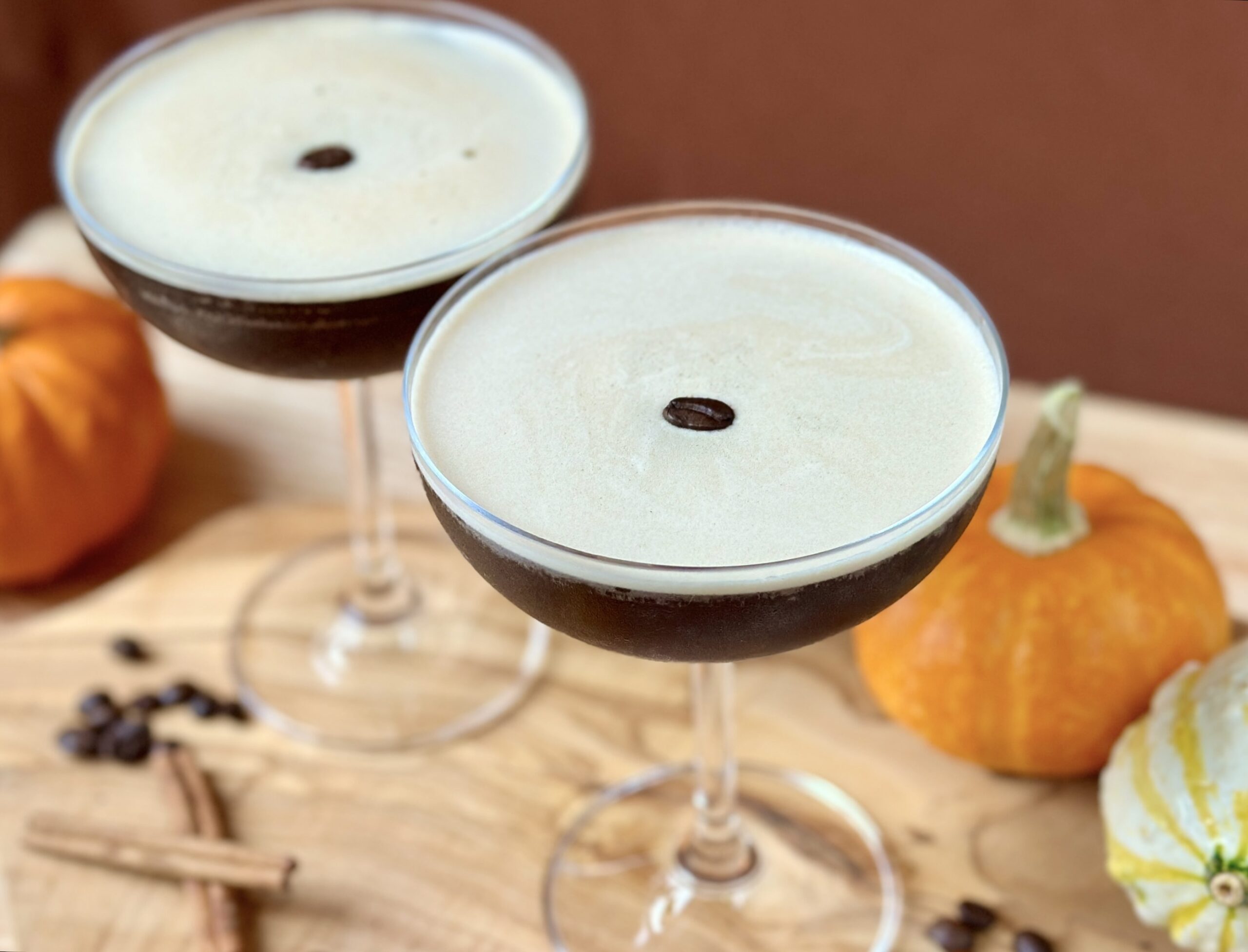 pumpkin spice espresso martini in coupe glass