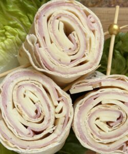 ham and cheese pinwheels on lettuce