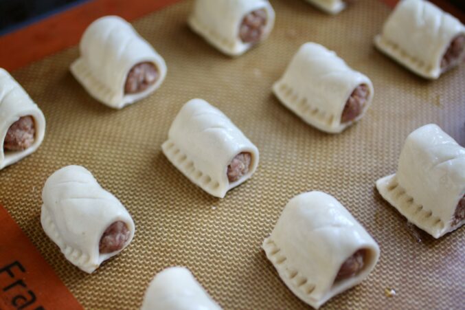 sausage rolls on a tray