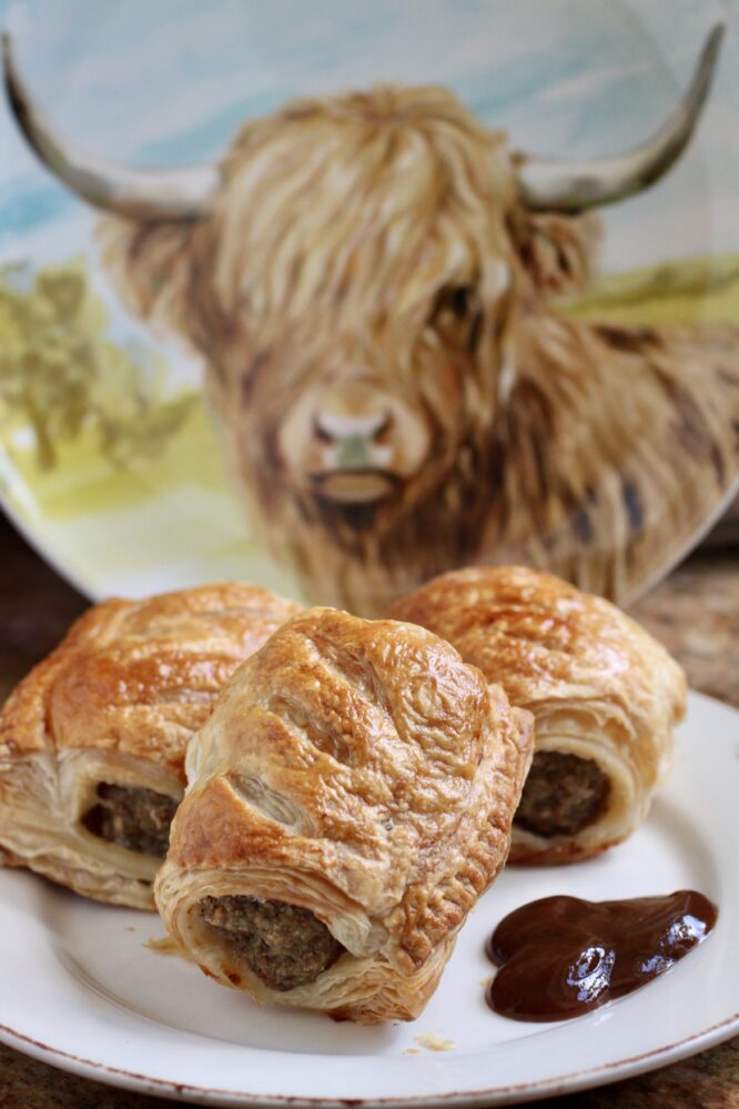 highland cow and sausage rolls