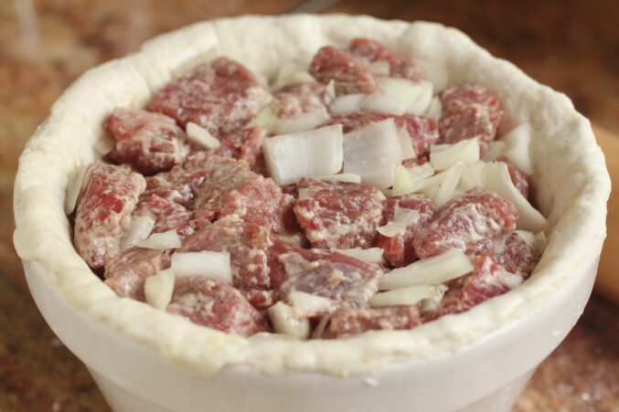 steak pudding ready to be sealed